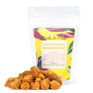 A bag of Lilikoi Passion Macadamia Nuts is shown with nuts scattered in front. The packaging is white with a colorful label listing the ingredients: Macadamia Nuts, Passion Fruit Juice, Passion Powder, Sugar, Butter, Salt, Cayenne Pepper, Brown Sugar. — perfect for adding a tropical twist to your bakery treats.